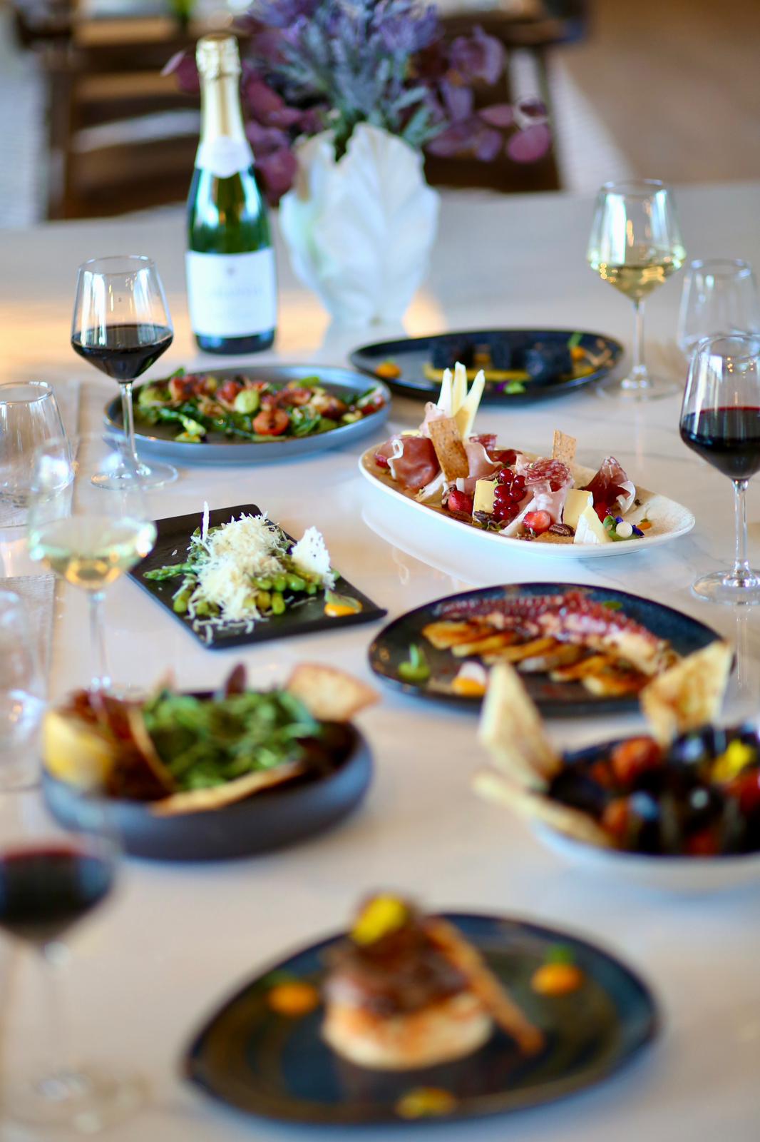 Charcuterie board with prosciutto and cheeses